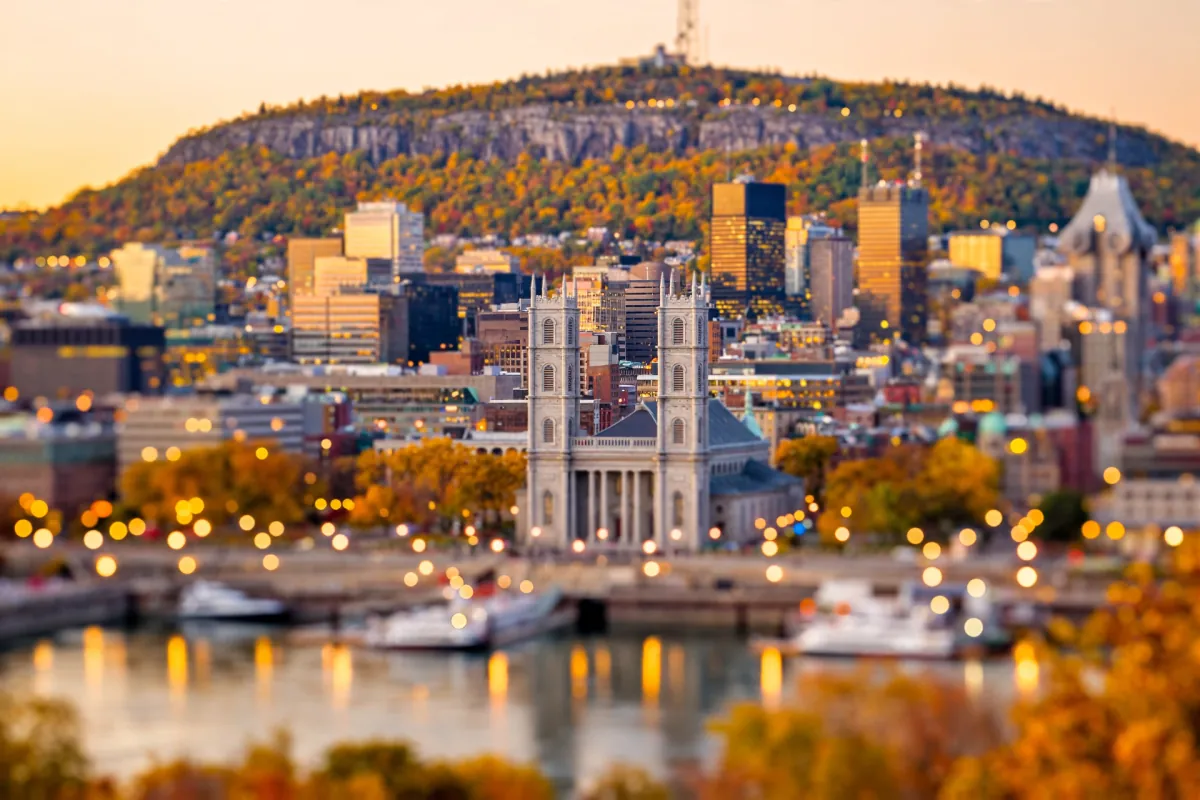 Montreal at autumn sunset with warm bokeh lights